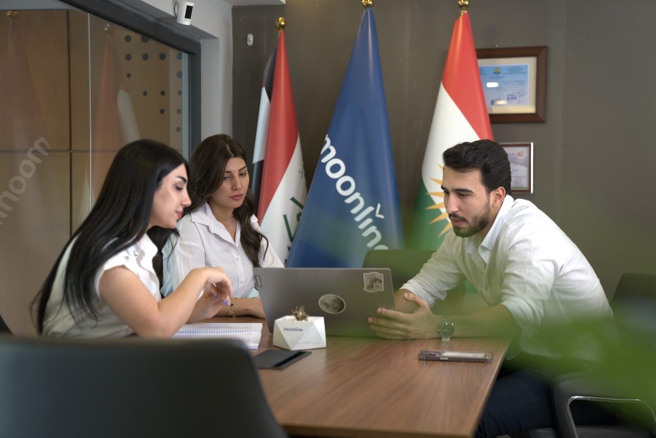 Woman holding papers in an office